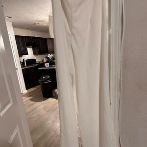 Brand new white jumpsuit with fur on top